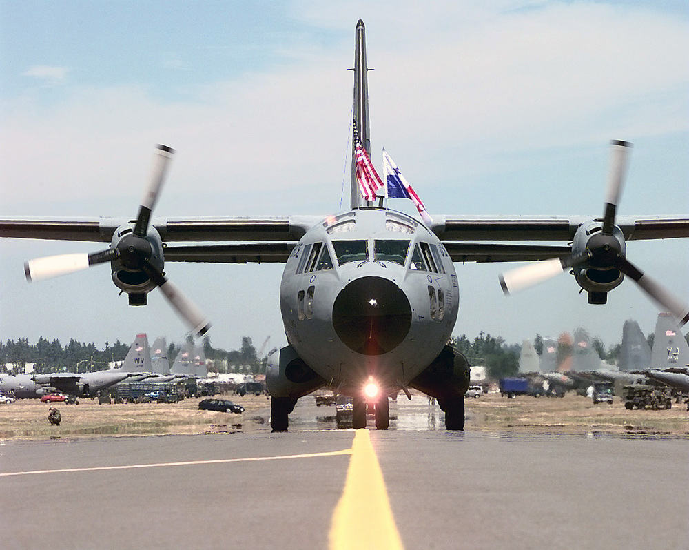 USAF_24th_Wing_C-27A_taxies_with_flags.jpg